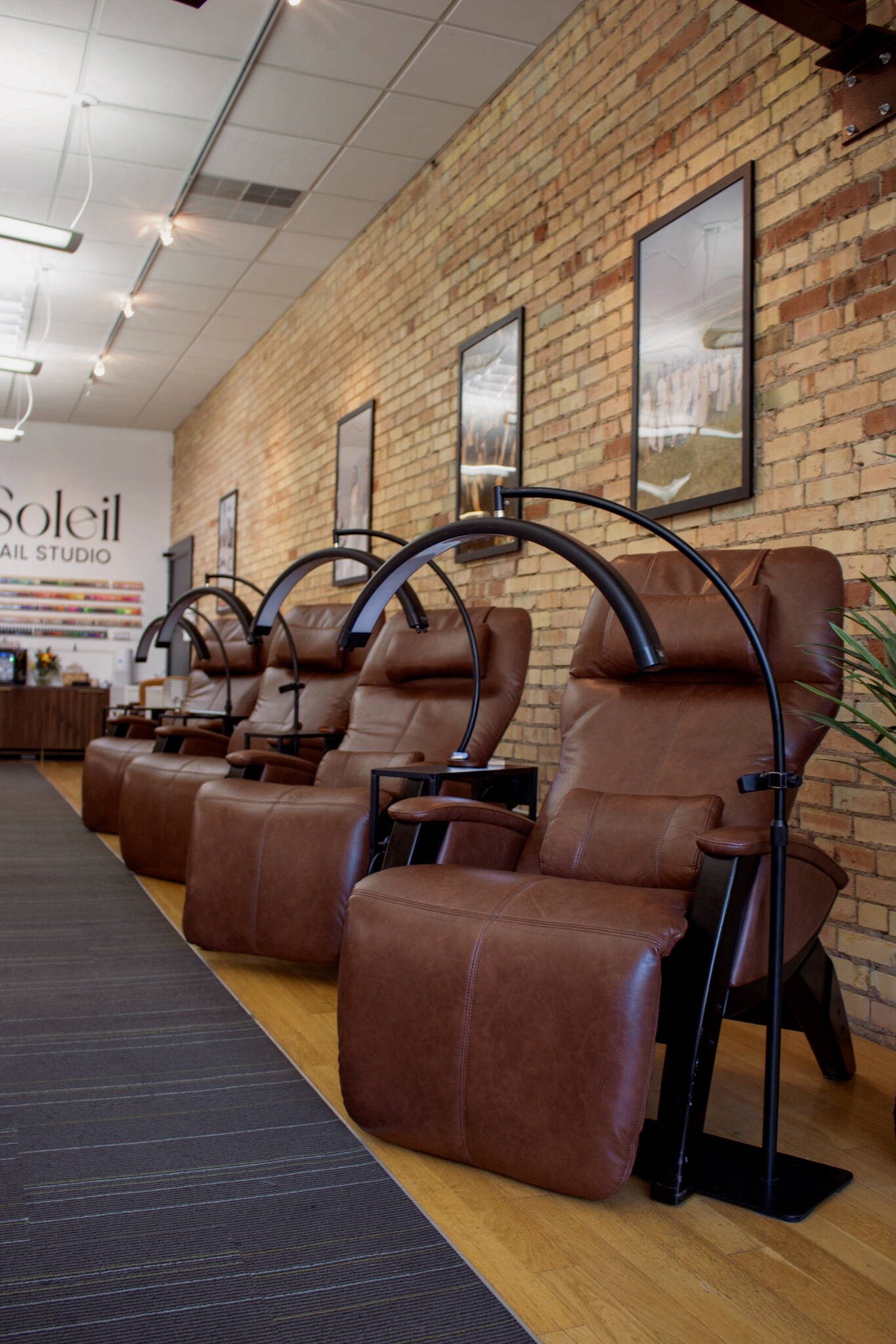 Zero-gravity pedicure chairs inside Soleil Nail Studio